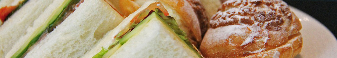 Eating Burger Sandwich Vietnamese at Viking’s Giant Submarines restaurant in San Francisco, CA.